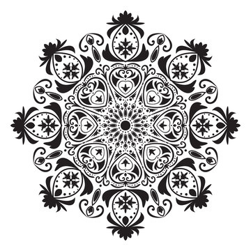 Black and white circular pattern or mandala