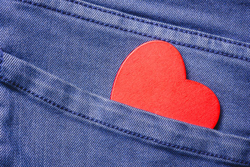 Fototapeta premium Wooden heart in jeans pocket.
