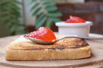 Slice toast bread with strawberry jam
