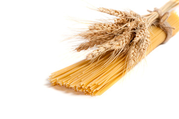 flour and wheat as the main ingredients for making spaghetti, isolated on white