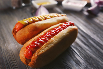 Hot dogs on wooden background