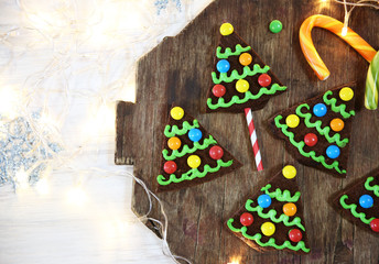 Fototapeta na wymiar Delicious colorful Christmas cookies with festive decoration