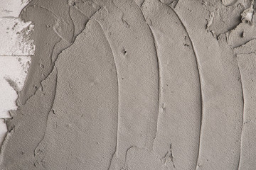 plasterer concrete on wall of loft house construction