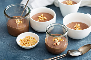 Chocolate yogurt dessert with salted peanuts