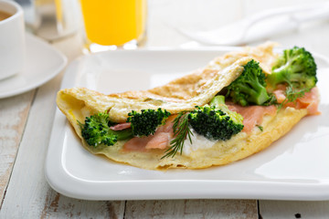 Egg-white omelet with salmon and broccoli