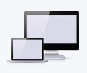 Black monitor and notebook with white screen