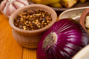 Fresh vegetables and spices on cutting board