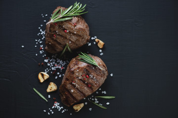 Above view of two grilled filet mignon beefsteaks, closeup
