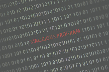 'Malicious program' text in the middle of the computer screen surrounded by numbers zero and one. Image is taken in a small angle. Image has a vintage effect applied