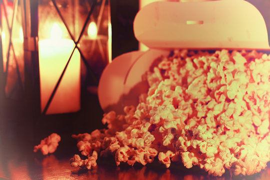 popcorn basket near candle