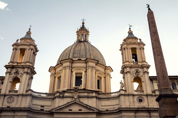 Fototapeta na wymiar Column in front of Historic Sant Agnese Church