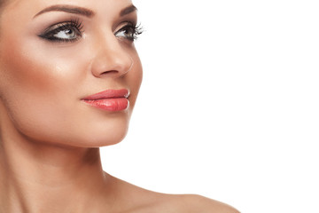 Fototapeta premium Smiling woman with perfect skin and make up