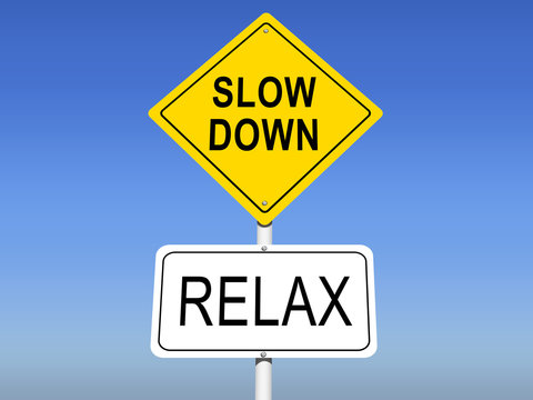 Slow Down - Relx Yellow Road Sign with Sky Background