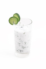 Cocktail from kefir with a cucumber on a white background