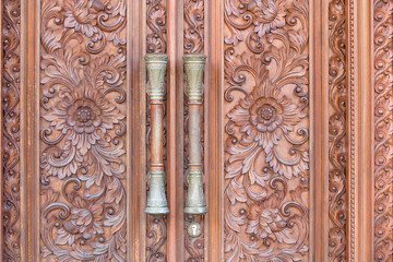 Fragment of an ancient carved wooden door