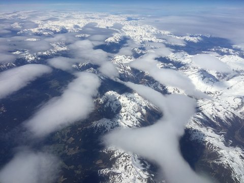 Mountain range aerial view . The alps with clouds Europe .
