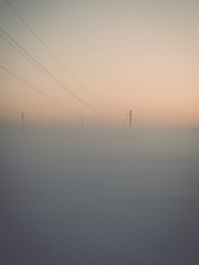 foggy country fields in winter on cold morning - vintage effect
