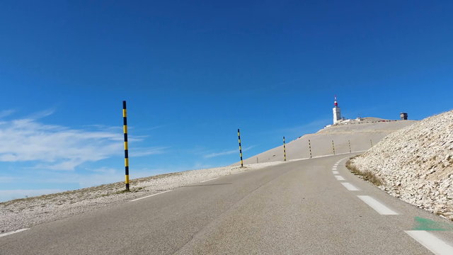 Vehicle point of view shot while driving on the road climbing the South face of the famous Mont Ventoux located in Provence in South of France