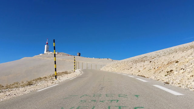 Vehicle point of view shot while driving on the road climbing the South face of the famous Mont Ventoux located in Provence in South of France.