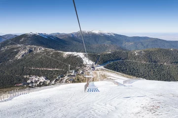Wandaufkleber Chair lift in Navacerrada Ski Resort, Navacerrada Mountain Pass, Madrid, Spain, on January 4, 2015 © ihervas