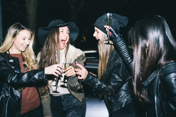 Four girls making party outdoor in the night