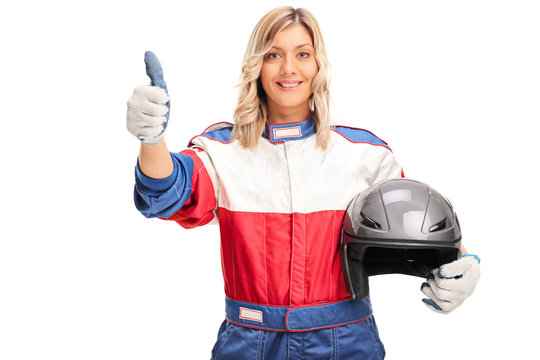 Female car racer giving a thumb up