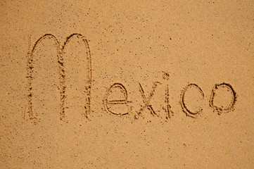 Mexico sign on the beach sand