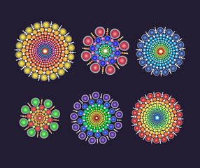 A set of fancy circular multicolored dotted ornament graphic elements for design and single use.