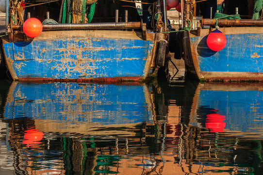 Fisherman boats moored along channel in Chioggia