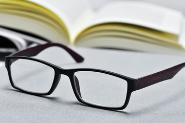 eyeglasses and open book