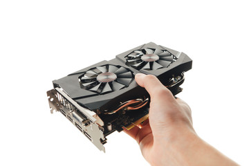 graphic video card in a hand, isolated on white