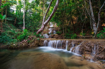 Naklejka na ściany i meble Ngao waterfall in the national park,Aumpher Ngao,lampang,thailand. 