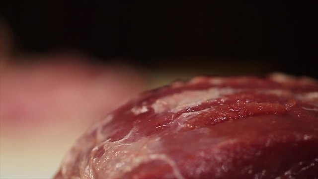 Fresh raw meat on table focus in, shef beat off meat focus in. Pork. Restaurant.