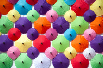 Fototapeta na wymiar Colorful umbrella texture on the wall.