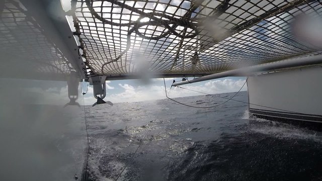 View under Catamaran sliding on the sea