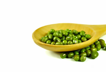 Beans in wood spoon isolated on white background