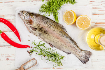 Fresh trout on white wood