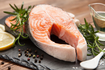 Fresh salmon on old wood