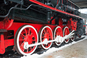 Old black steam locomotive wheels