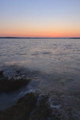Obraz premium Rocky coast before sunrise in the summer morning in Croatia
