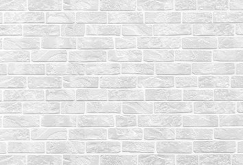 White stone brick wall texture and background seamless.