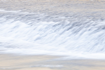 Fast and flowing waterfall  background , long exposure