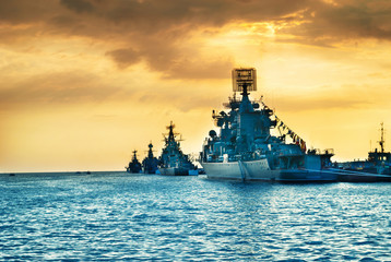 Military navy ships in a sea bay