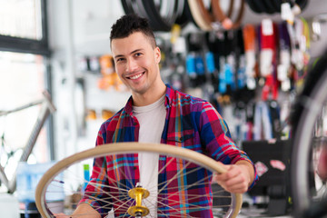 Salesman in bicycle shop 
