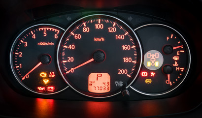 Fototapeta premium Modern car illuminated dashboard closeup