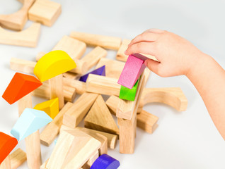 child playing  toy block