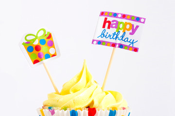 festive pink Cake on a white background, with a sign happy birthday