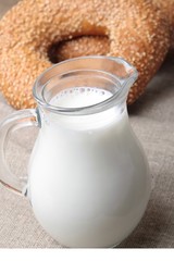 bagel with sesame seeds and milk