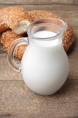 bagel with sesame seeds and milk
