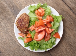 Fried cutlet meatballs with salad